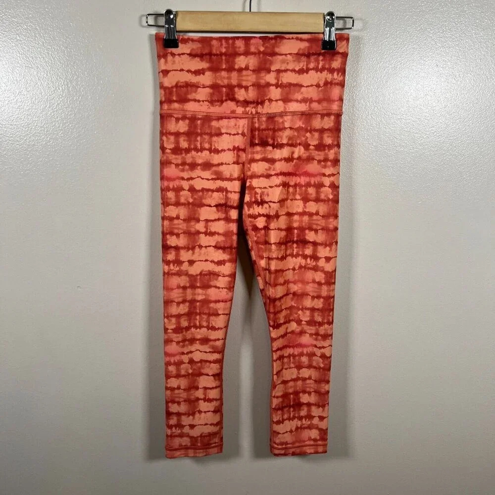 Athleta Elation Printed Capri Leggings Size XS Orange Yoga Athletic Workout Gym